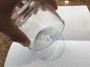 Pouring Powder on a Folded Paper